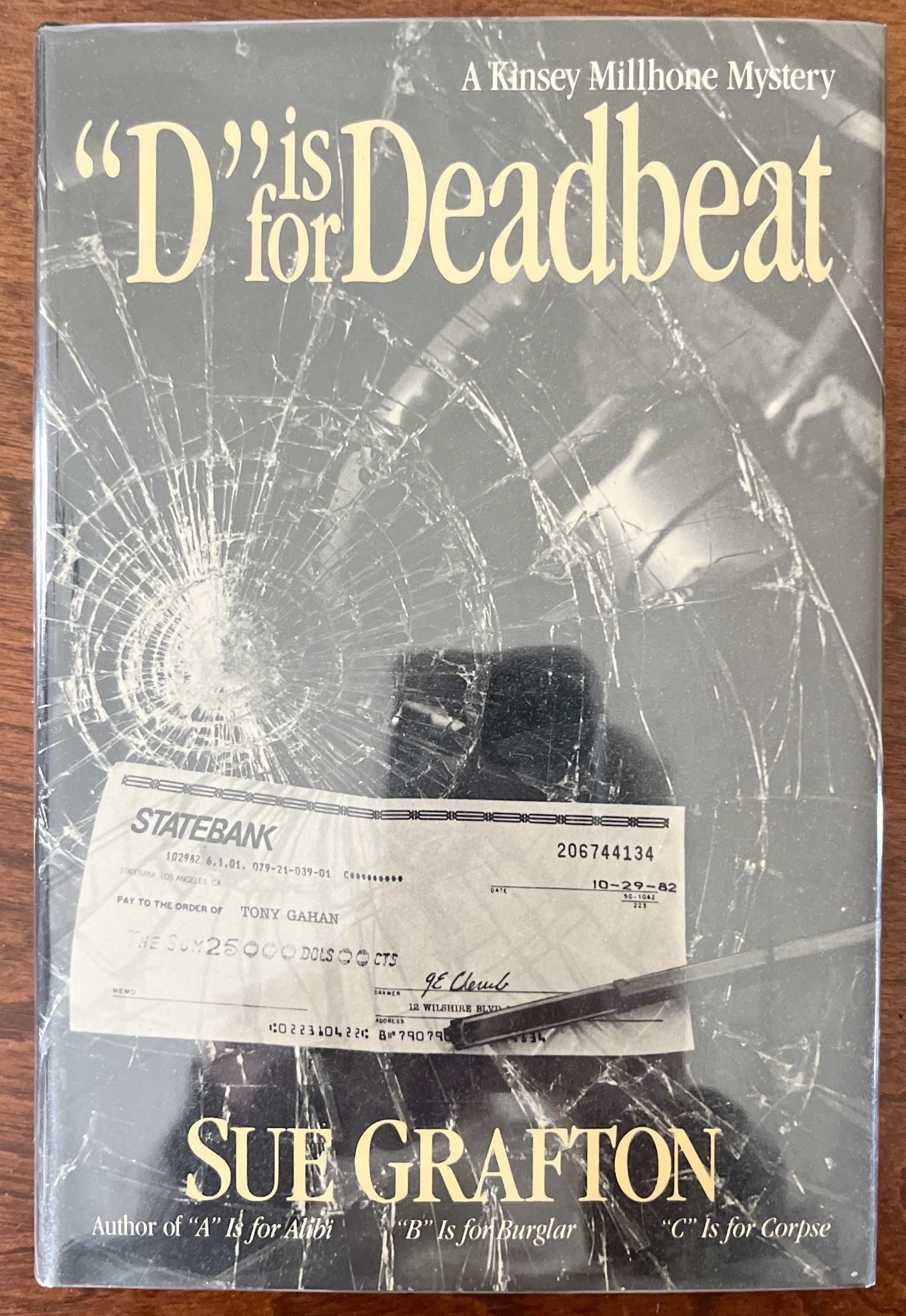D is for Deadbeat, Signed
